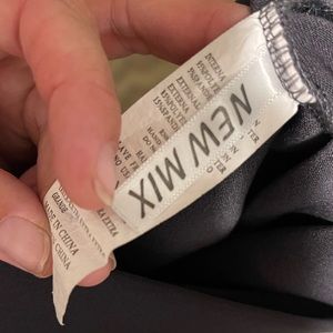 New Mix brand. Gray in color. Pencil skirt